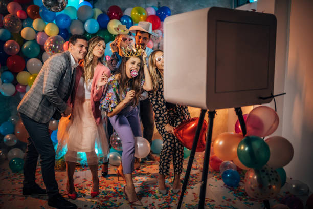 group of people, men and women having fun together at the party.